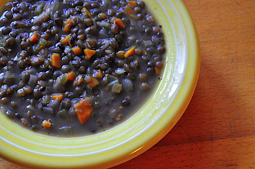 A bowl of pressure cooker French Lentils (Lentils du Puy)