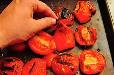 Peeling the skins from the tomatoes