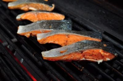 Salmon filets on the grill, flesh side down