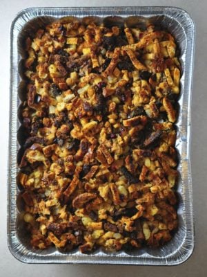A pan of stuffing with cranberries and apples