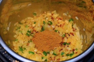 Aromatics cooked, adding the spices