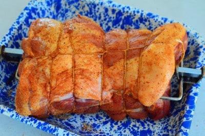 Rubbed, trussed, and secured to the spit