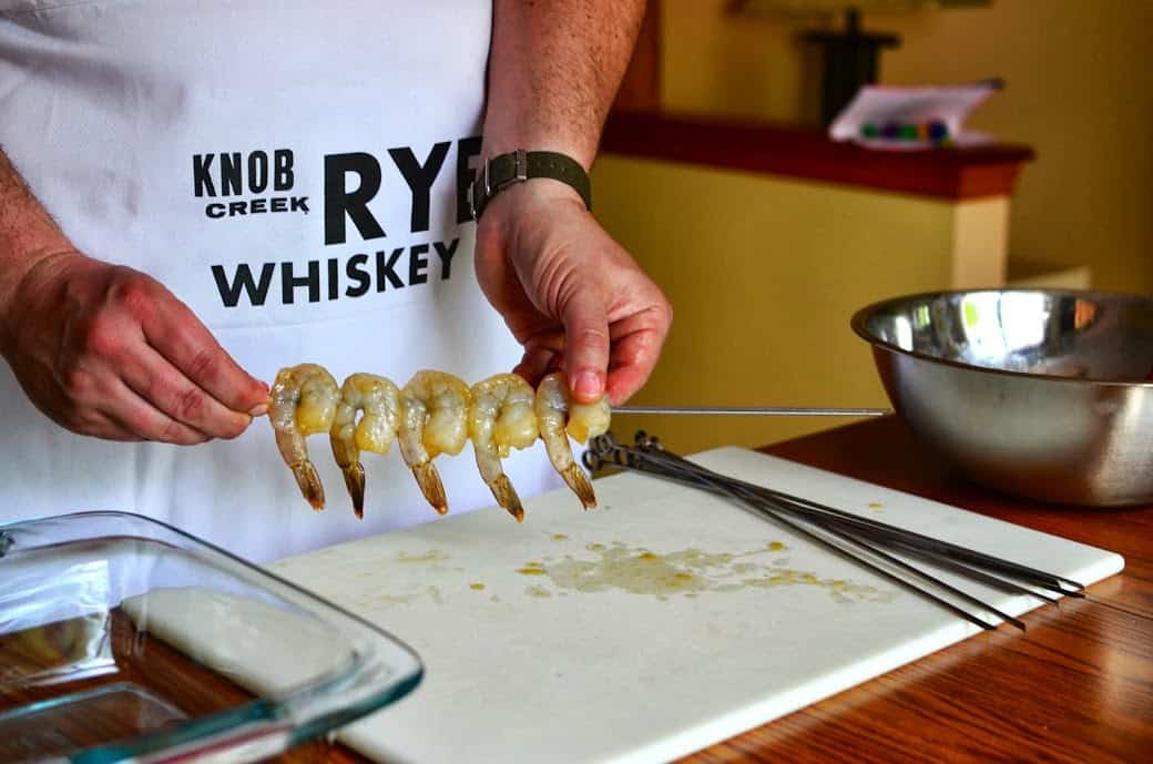 Skewering marinated shrimp