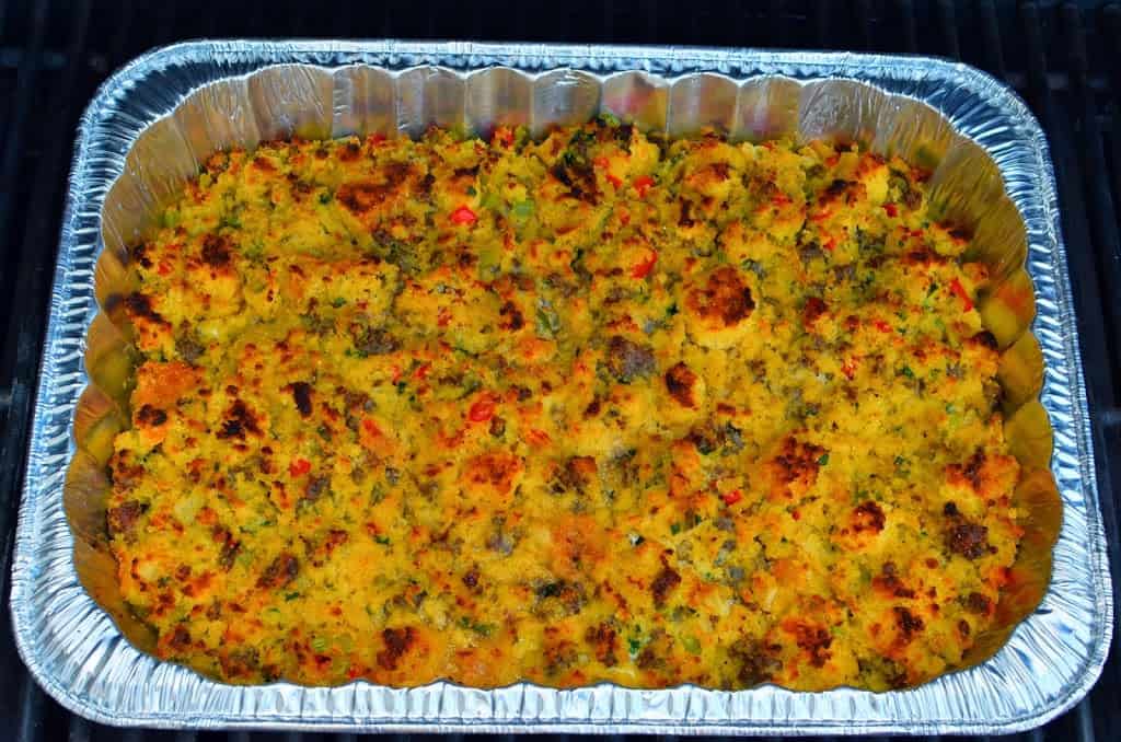 A foil pan of cooked cornbread dressing