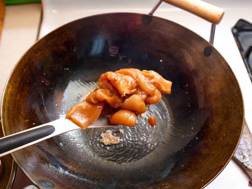 Chicken going into the wok