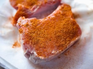 Rubbing ribeye pork chops