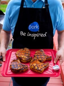 Grilled ribeye pork chops on platter