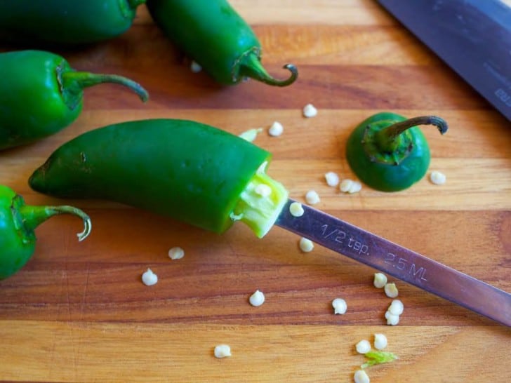 Coring out the jalapeno