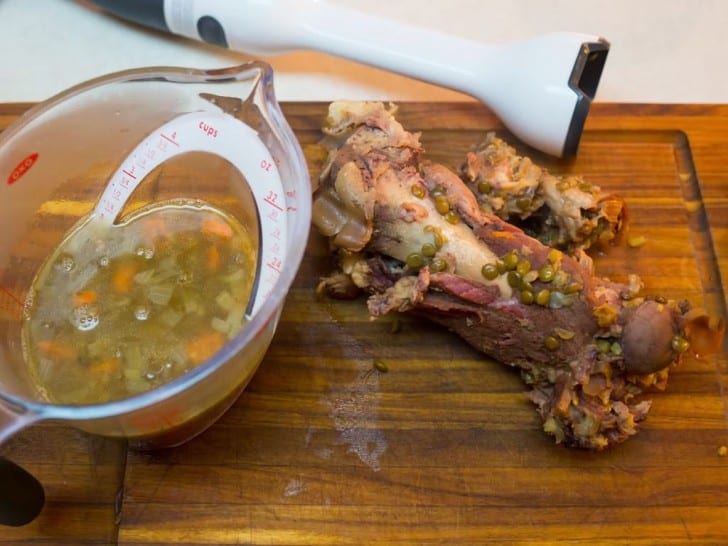 Pureeing lentils to thicken, picking the ham from the bone | DadCooksDinner.com