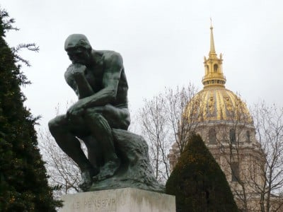 Rodin museum - The Thinker, with the dome of des Invalides