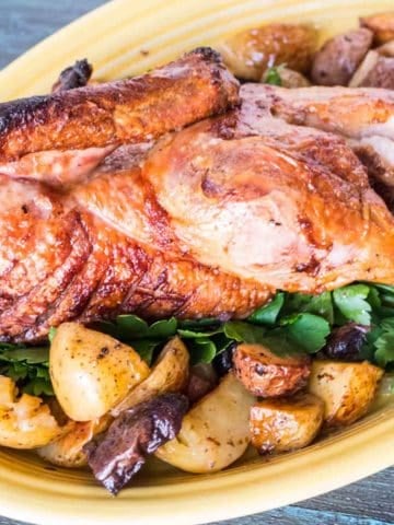 Rotisserie Duck with Drip Pan Potatoes | DadCooksDinner.com