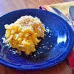A plate of Mac and Cheese with bread crumbs