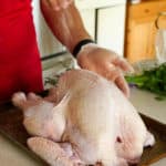 Sprinkling salt on the Thanksgiving turkey | DadCooksDinner.com