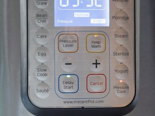 Instant pot control panel with Delay Start button lit up