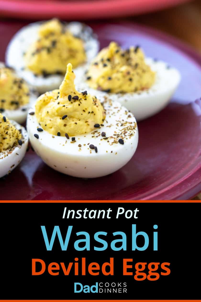 Instant pot wasabi deviled eggs arranged in a circle on a purple plate