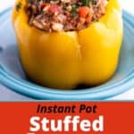 A stuffed yellow pepper in a blue bowl