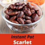 A bowl of cooked scarlet runner beans on a white table