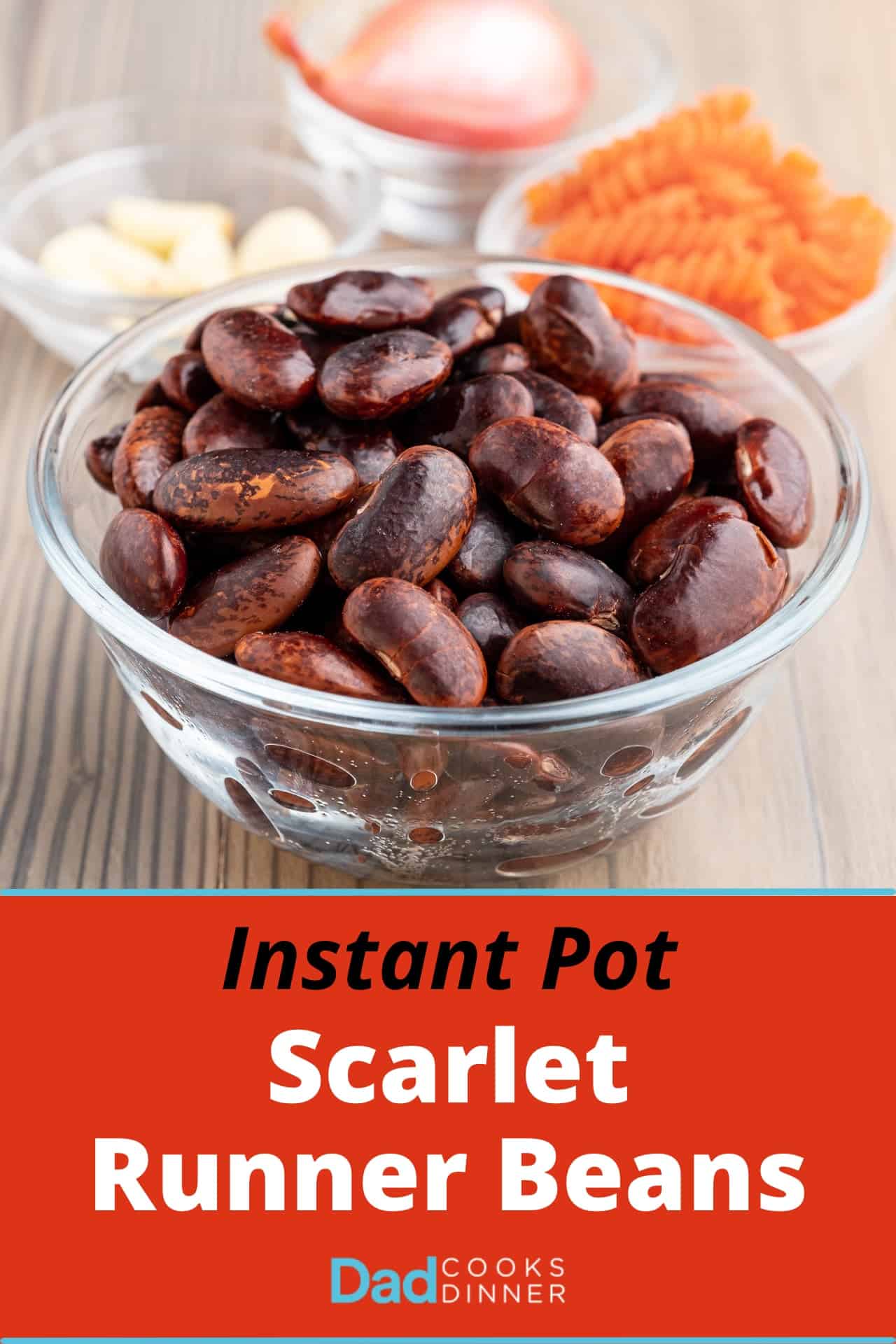 A bowl of cooked scarlet runner beans on a white table