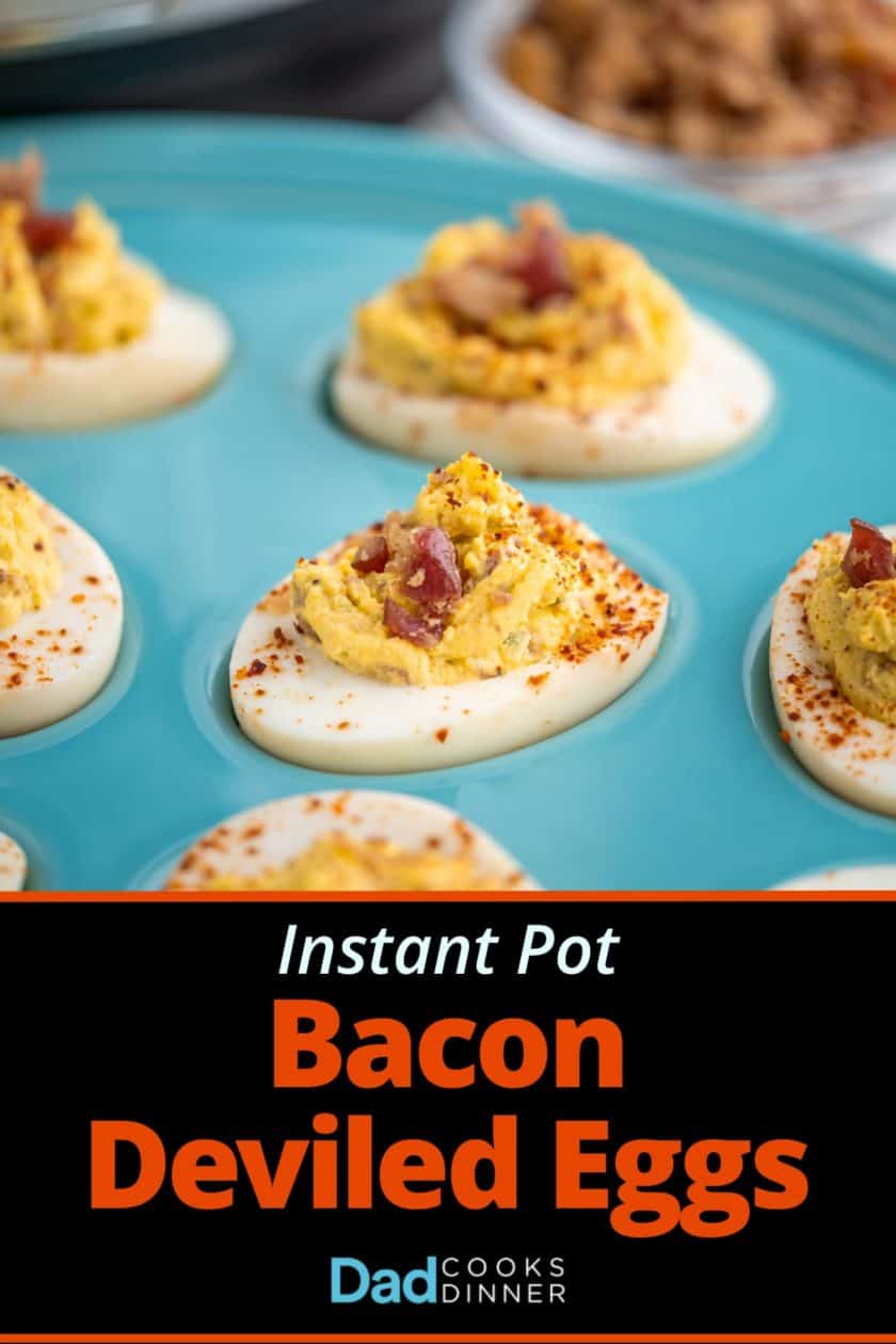 A turquoise plate of deviled eggs with bacon