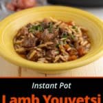 A yellow bowl of youvetsi - greek lamb stew with orzo