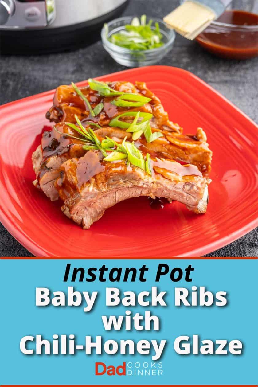 A sliced rack of baby back ribs sprinkled with green onions with an Instant Pot and bowl of glaze in the background