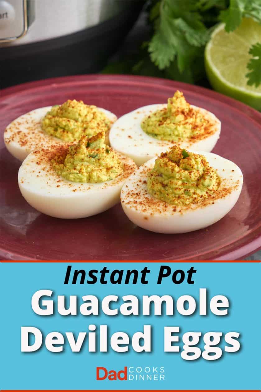 Four guacamole deviled eggs on a maroon plate, with an Instant Pot and cilantro and a lime in the background
