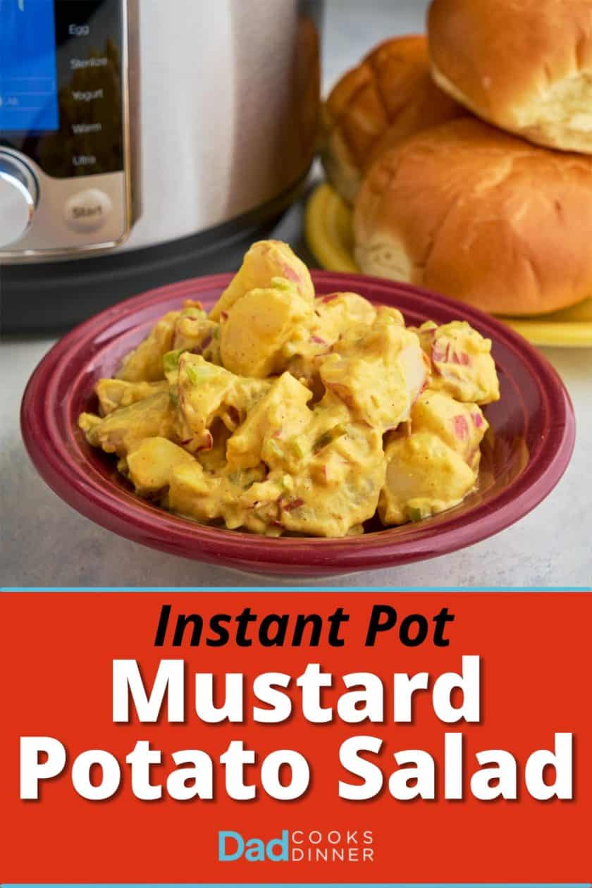 A bowl of mustard potato salad in front of a plate of hamburger buns and an Instant Pot