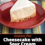 A slice of cheesecake with sour cream topping