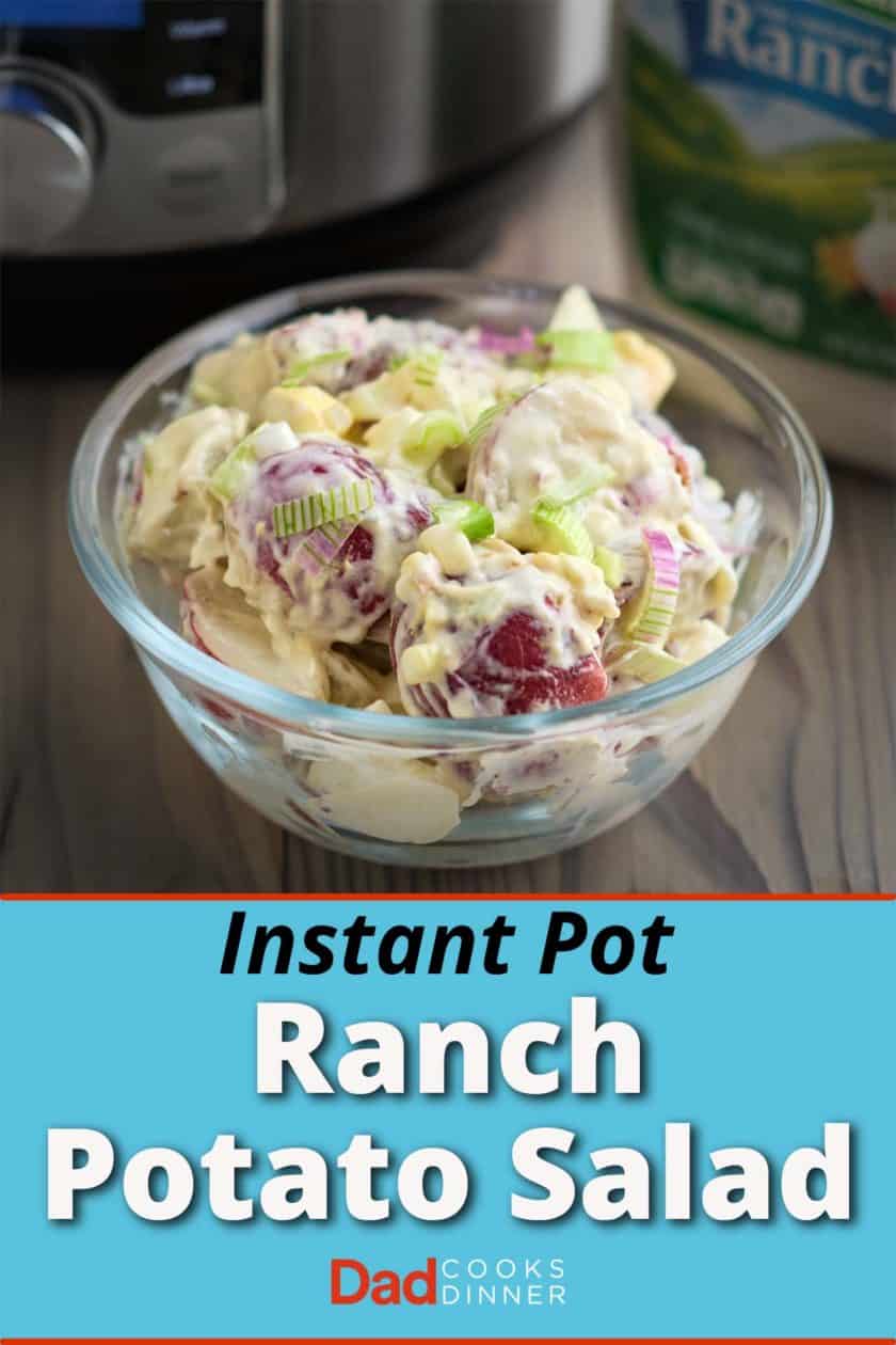 A bowl of ranch potato salad with an Instant Pot and bottle of dressing in the background