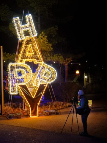 Lit up "Happy" sign at the Cleveland Metroparks Zoo Wild Winter Lights festival