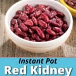 A bowl of cooked red kidney beans, with uncooked red kidney beans in the background