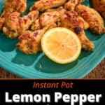 A platter of lemon pepper chicken wings, with a lemon half