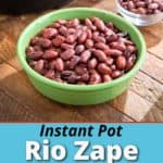 A bowl of cooked Rio Zape beans on a wood table, with a dish of uncooked beans and an Instant Pot in the background
