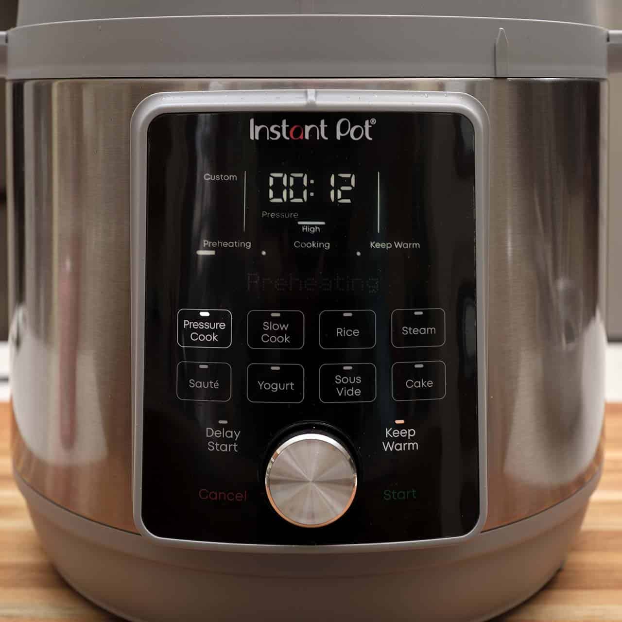 An Instant Pot set to pressure cook for 12 minutes