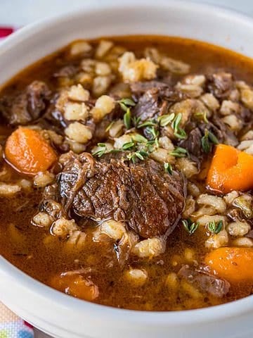 A bowl of beef and barley soup