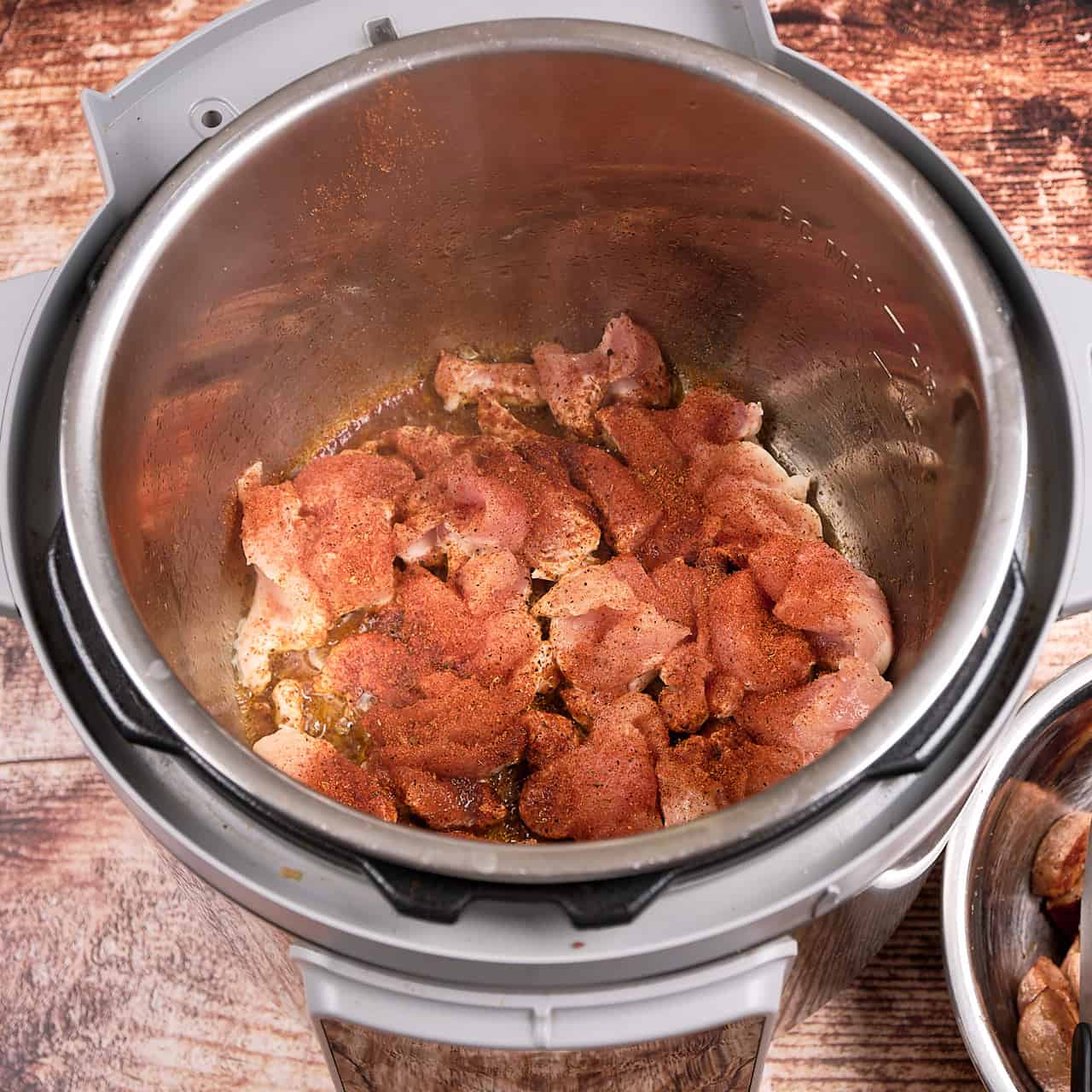 https://www.dadcooksdinner.com/wp-content/uploads/2023/03/Sauteing-Chicken-for-Instant-Pot-Pastalaya-DSCF9297-1280x.jpg