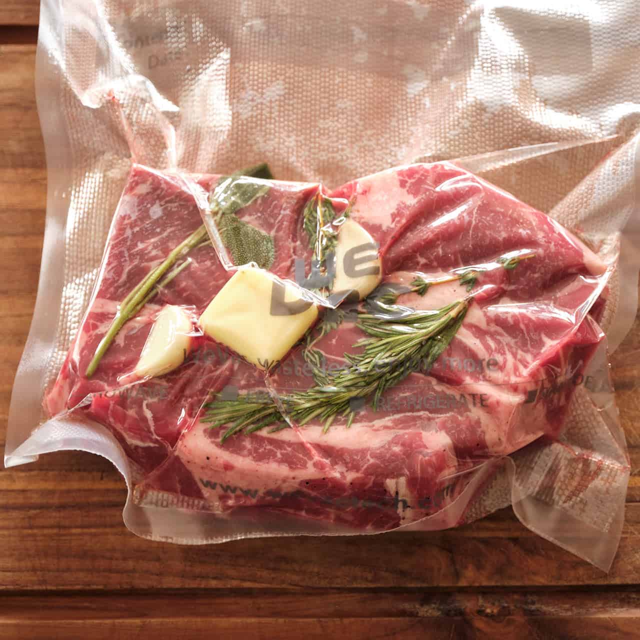 Chuck steak, herbs, garlic, and butter, vacuum sealed