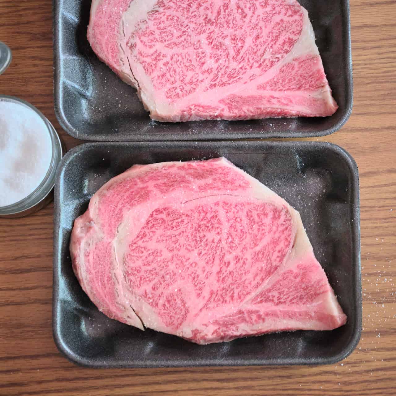 Salting the Wagyu steaks early