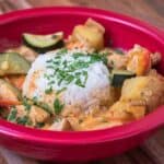 Instant Pot Thai Yellow Curry in a red bowl