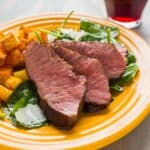 Sous Vide Flat Iron Steak on a bed of kale salad