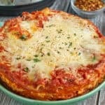 Instant Pot Lasagna on a plate with spices in the background