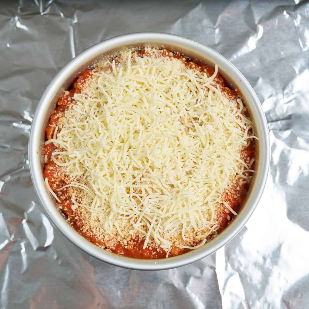 Last layer - no ricotta - add a layer of noodles, the rest of the sauce, sprinkle with parmesan, and the rest of the mozzarella