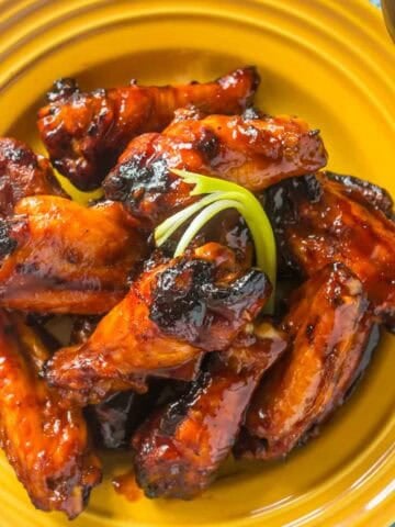 A plate of grilled Korean chicken wings