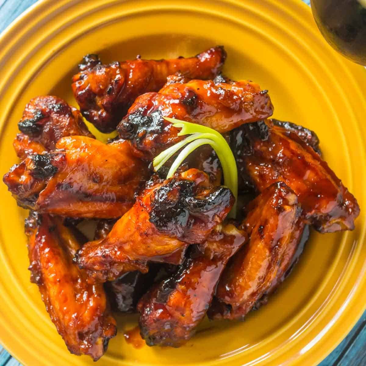A plate of grilled Korean chicken wings