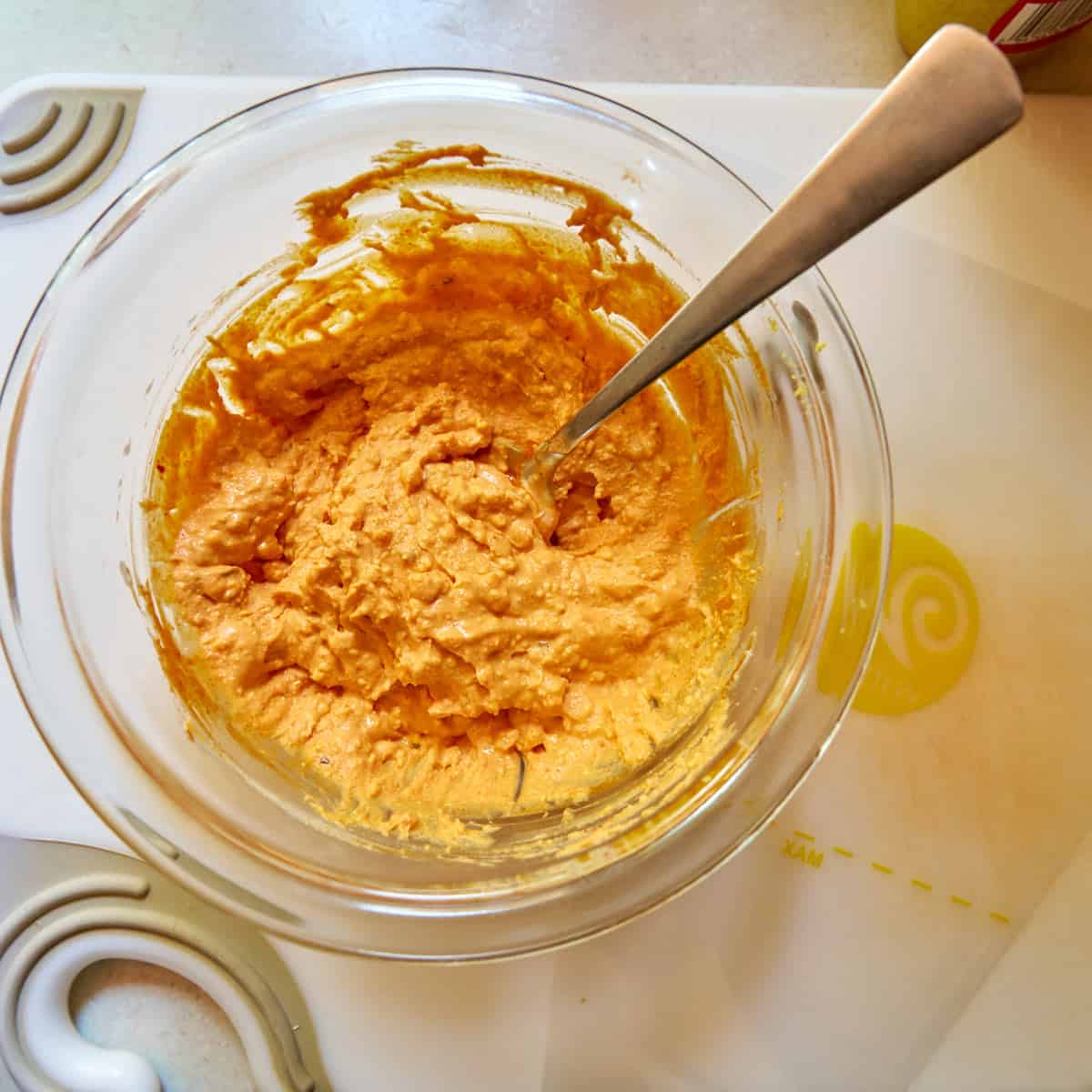 Kimchi deviled egg filling mixed and ready to go into piping bag