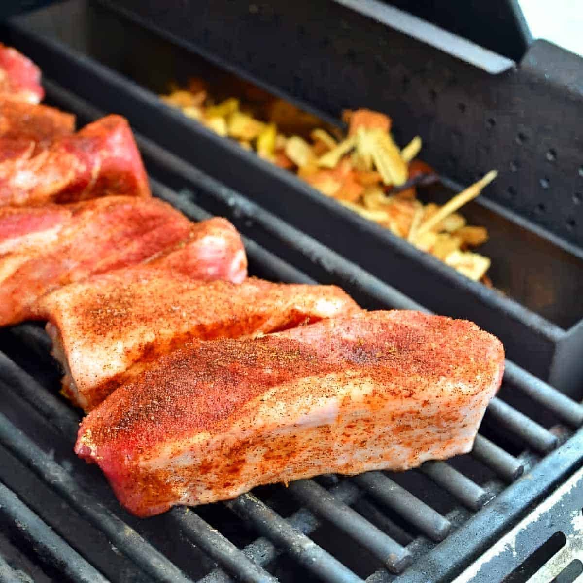 Pork shoulder ribs ready to smoke on the grill