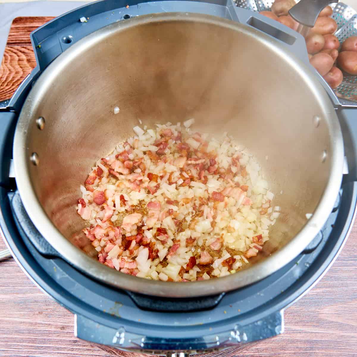 Sautéing the bacon and onions in the Instant Pot