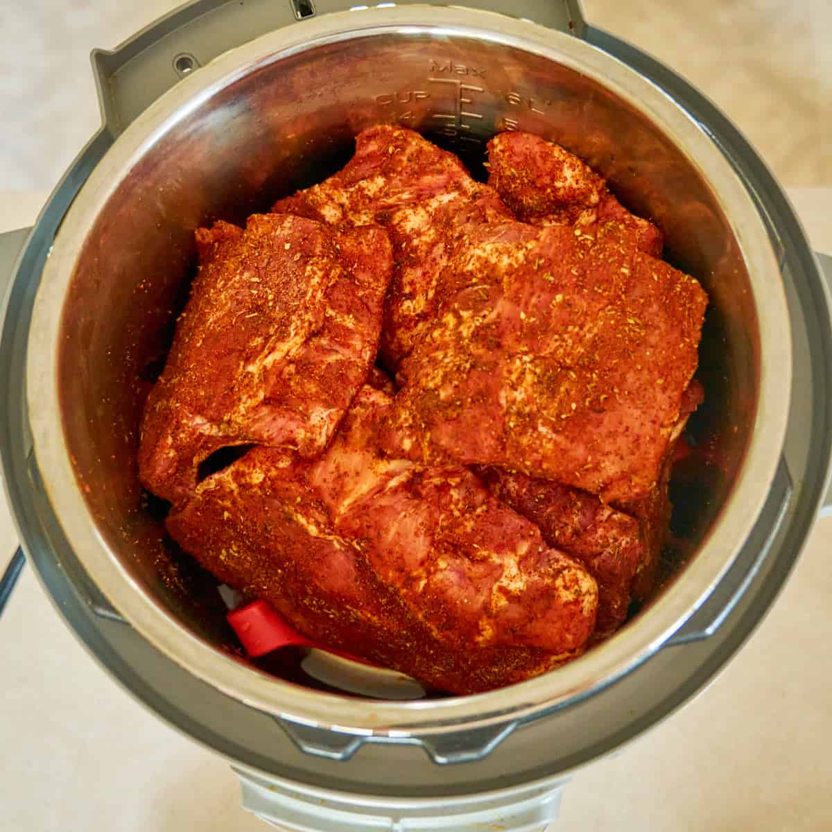 Ribs stacked in the Instant Pot on a rack
