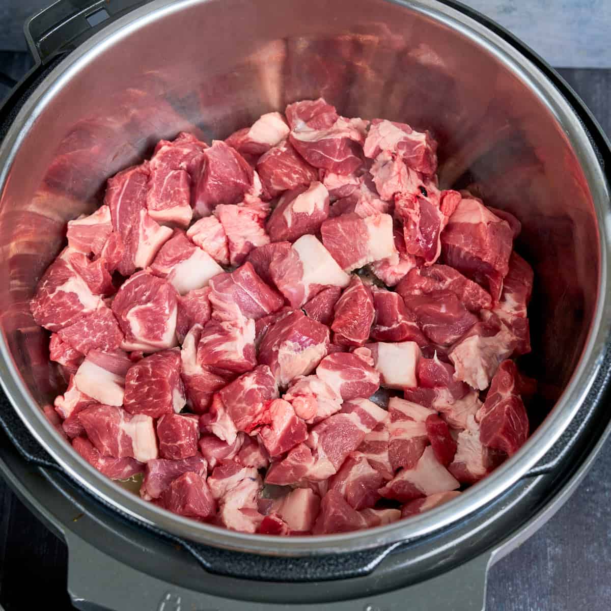 Browning the pork for Instant Pot Pozole (I overcrowded the pan - don't put this much in)