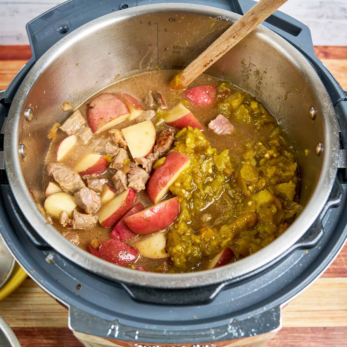 Green Chile Stew ingredients in pot